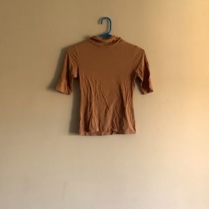 Brown mock neck shirt